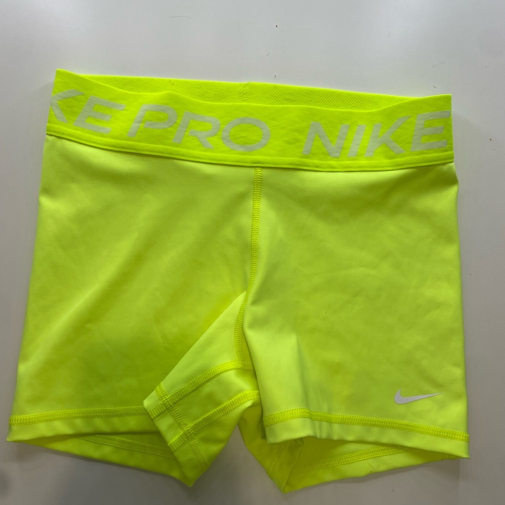Neon yellow Nike spandex shorts